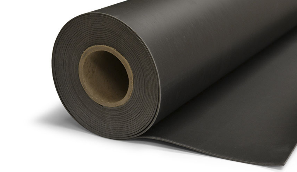 Close-up of a roll of mass-loaded vinyl ready for installation on a surface